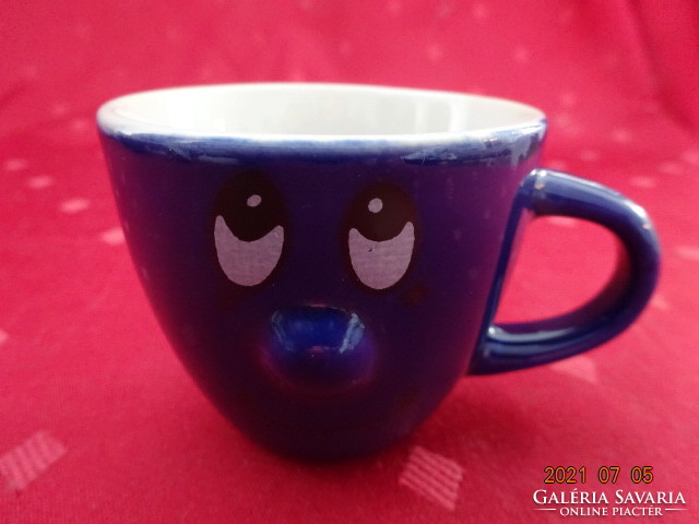 Glazed ceramic coffee cup with a figure on the side, height 5 cm. He has!