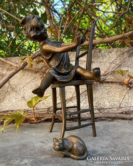 Little girl playing with a cat - bronze sculpture works of art