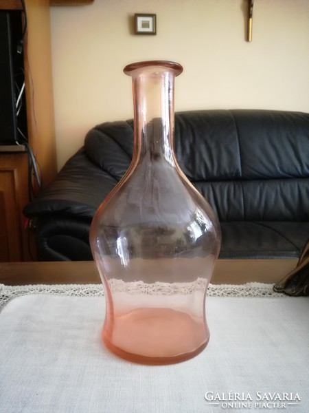 Old pink, salmon-colored glass, vase