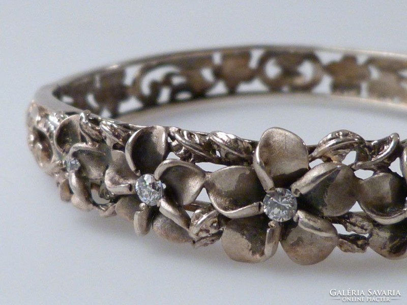 Antique silver bracelet with white stones