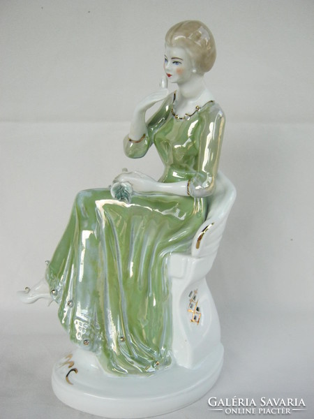 Retro ... Woman sitting on a large porcelain chair