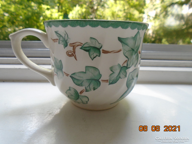 Ribbed English tea cup with an ivy leaf pattern