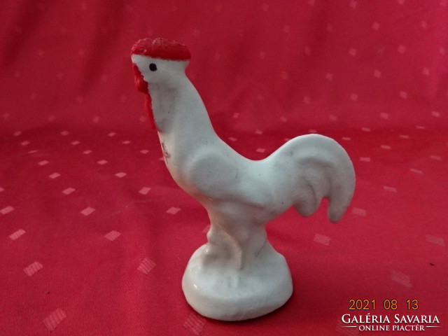 Aluminum rooster with plastic coating, height 11 cm. He has!