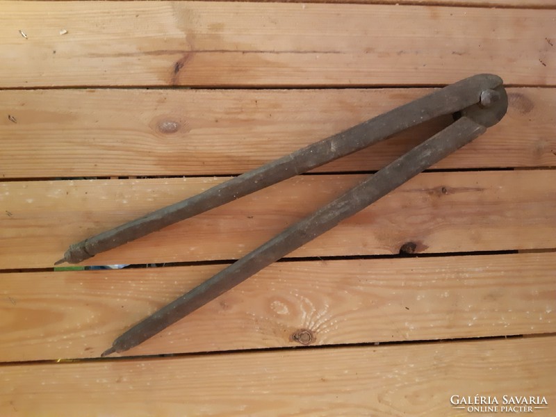 Very old wooden compass, carpenter or cooper compass