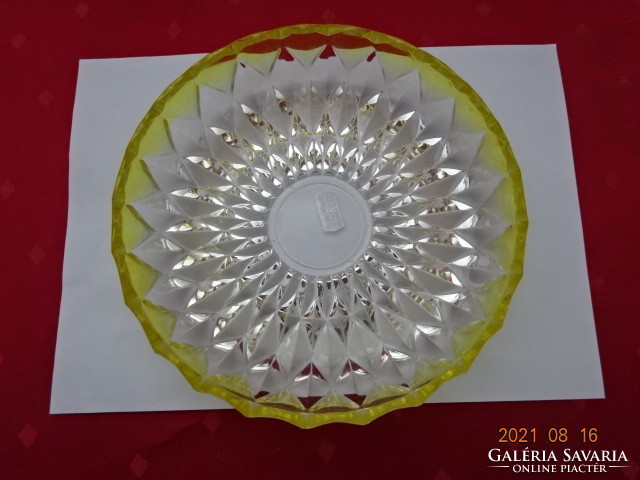 Glass centerpiece with yellow edge, diameter 21 cm. He has!