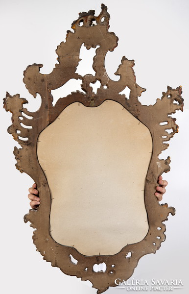 Mirror in a wooden frame. Hand carved silver ornaments. 150 years old.