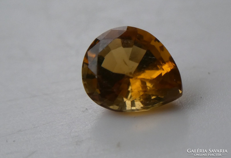 Natural yellow-brown tourmaline mineral polished gemstone. 0.83 Ct