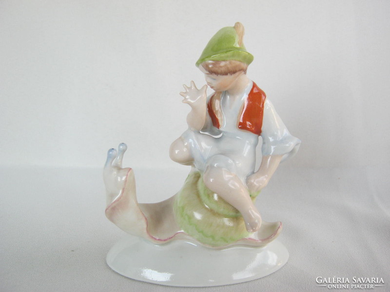 A boy traveling on a snail-back porcelain from the Drasche quarries