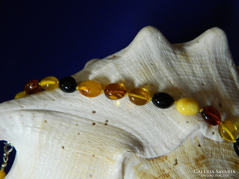 Beautiful multi-type amber necklace knotted by eyes