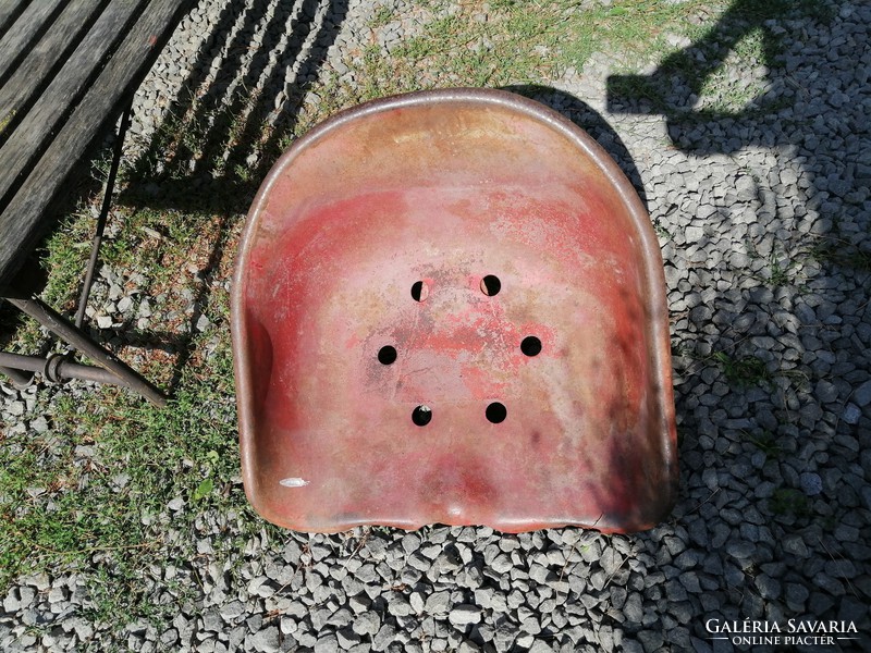 Red tractor seat