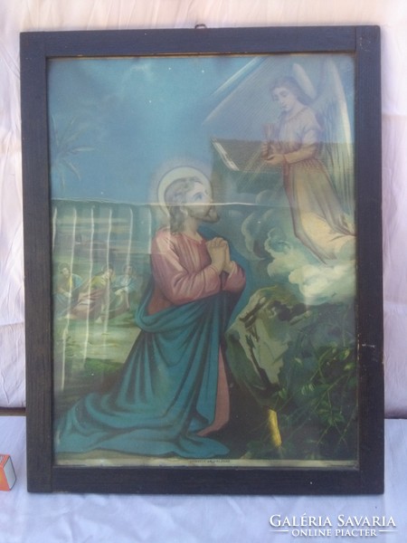 Old holy image frame under glass