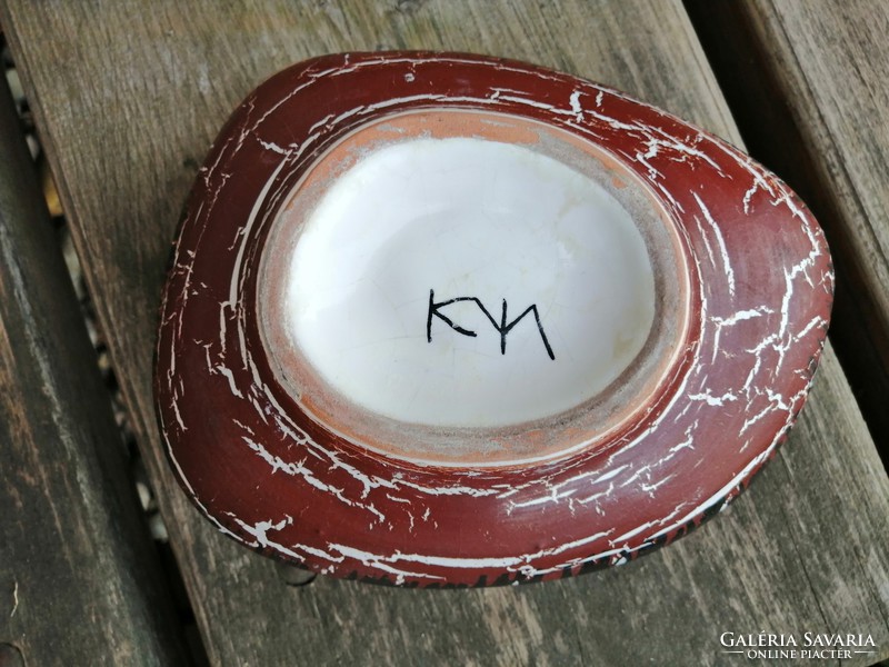 Pebble-shaped ikebana, marked with ceramics