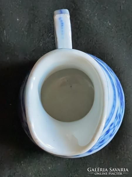 Antique blue and white thick-walled porcelain milk spout