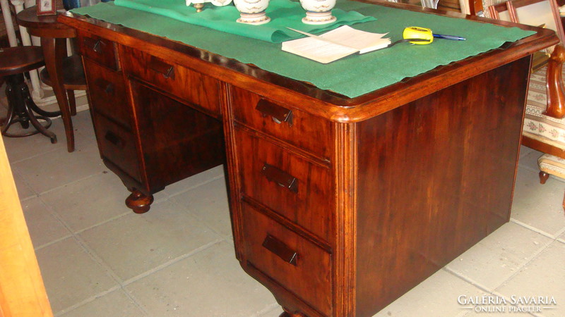 Old German renovated desk with seven drawers.