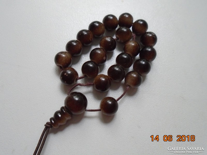 Mala with shades of brown with 21 grains and guru pearls