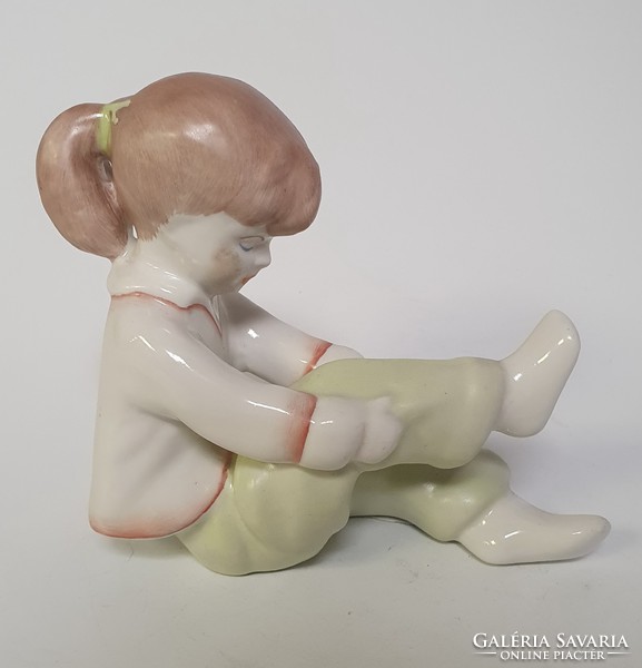 Aquincum porcelain figurine, statue of little girl with pigtails sitting
