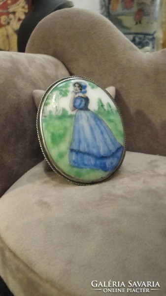 Silver brooch with hand-painted porcelain