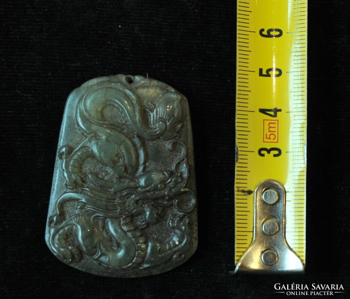 Hand carved jade pendant