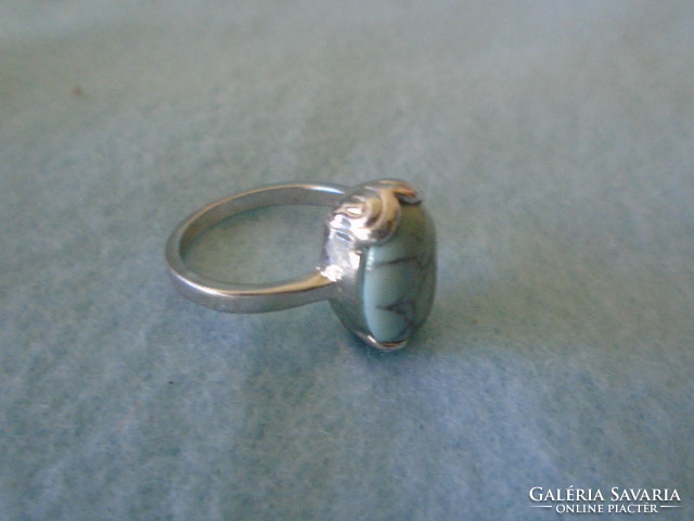 Rodiumozott antialergén női gyűrű türkiz kővel belső méret 18 mm új nem használt. posta 700 ft ..