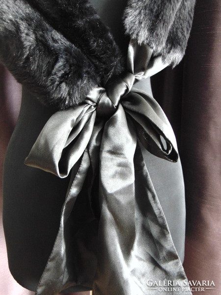 Black faux fur scarf with silk tie and cream knitted hat