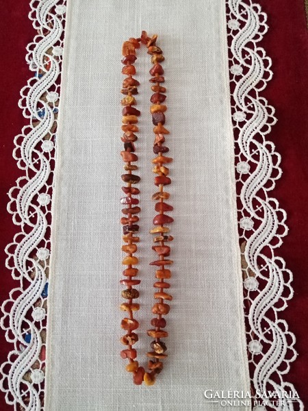 Old Baltic amber necklace with special lace, big eyes