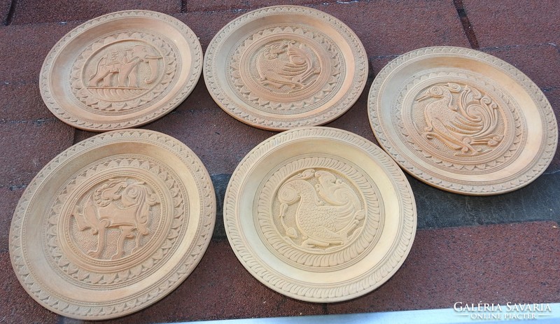 Hand-carved handcrafted wooden wall plates - with oriental / mythological figures