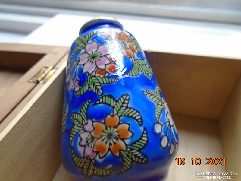Small royal blue Chinese vase with hand painted colorful floral patterns