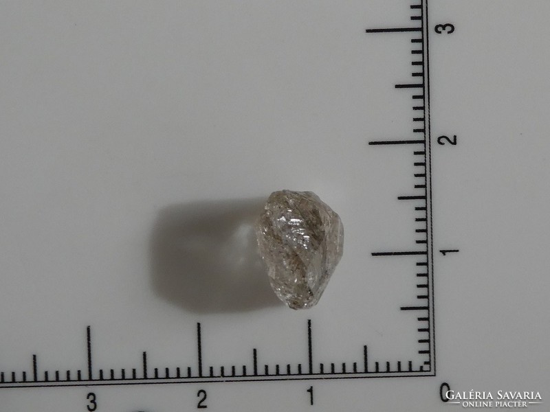 Natural, raw, oil-enclosed quartz piece. (Herkimer diamond) 3.65 ct. UV light reactive mineral.