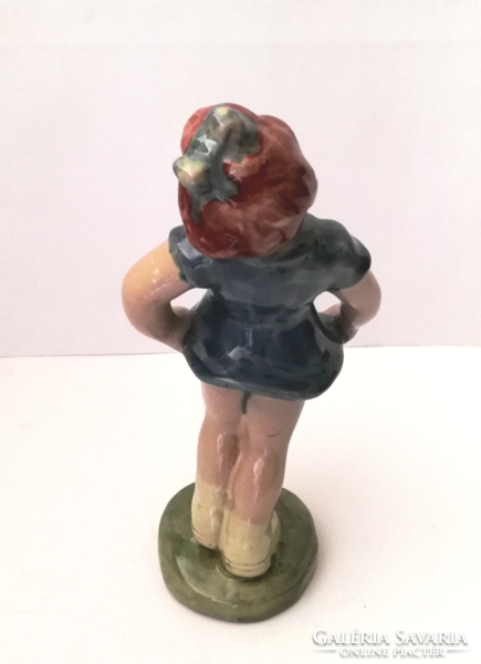 Old ceramic little girl figurine with nipple