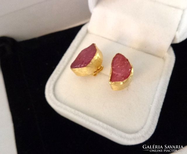 Raw ruby stone earrings in gold color metal socket