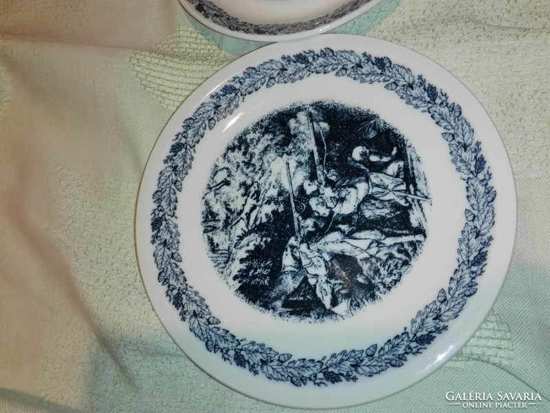 Hunting scene with soup placemat on a plate.