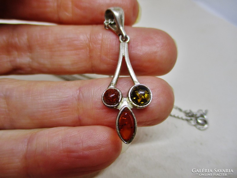 Beautiful silver necklace with real amber pendant