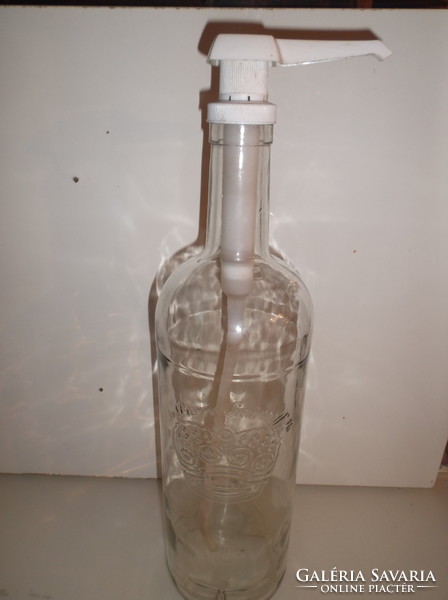 Bottle - 2 liters - smirnoff vodka - glass - dispenser - embossed pattern on the bottle is flawless