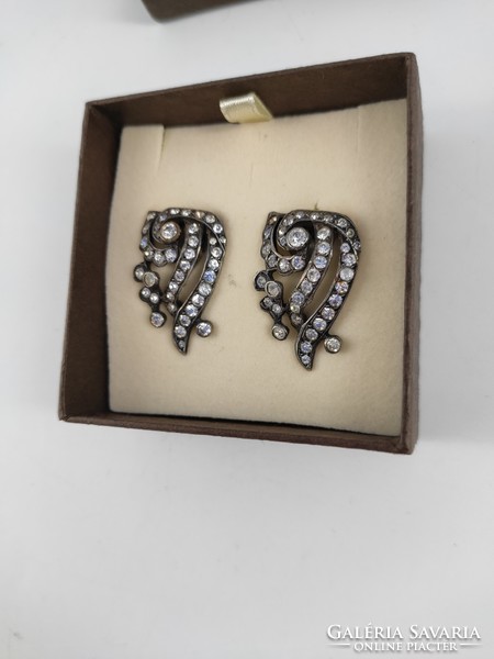 Silver earrings with stones in a gift box