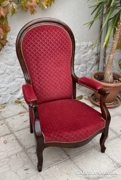 Antique neo-baroque walnut upholstered armchair