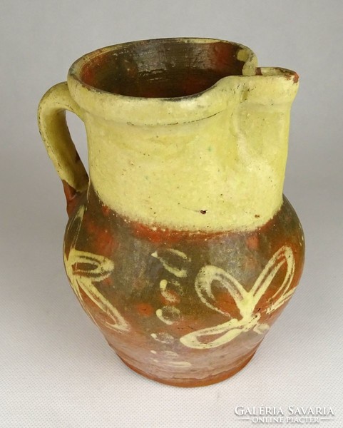 1G557 antique floral ceramic jug 17 cm