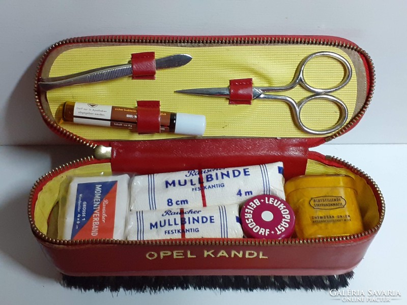 Retro marked clothes brush red leather zipped top with travel first aid kit