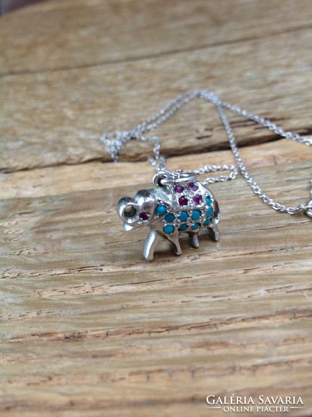 Silver necklace with silver elephant pendant and ruby and chrysoprase stones