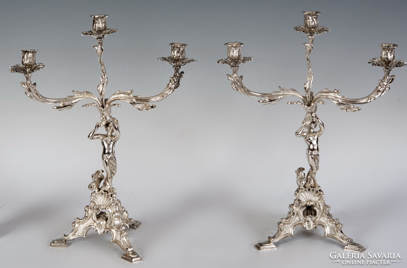 Silver figural candlestick in pairs