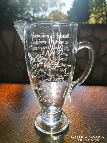 Angelic engraved glass pitcher