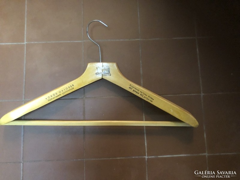 Antique clothes hanger marked