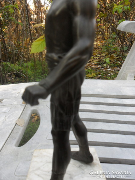 Bronze tin man statue
