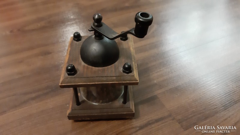 Pepper mill in a wooden house