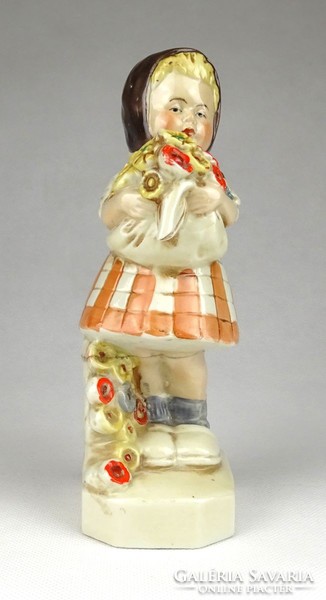 1G602 German porcelain statue with little girl with bouquet of flowers