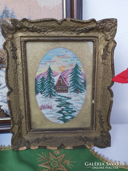 Old beautiful patterned tapestry, tapestry winter landscape, woody, pine tree, house. Collective beauty