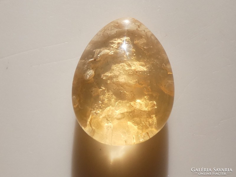 A precious stone polished from a combination of natural quartz, opal and kaolinite. 2.9 Ct