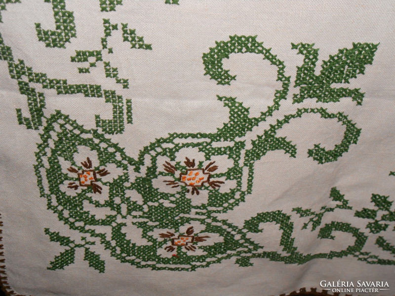 Antique hand embroidered linen tablecloth.