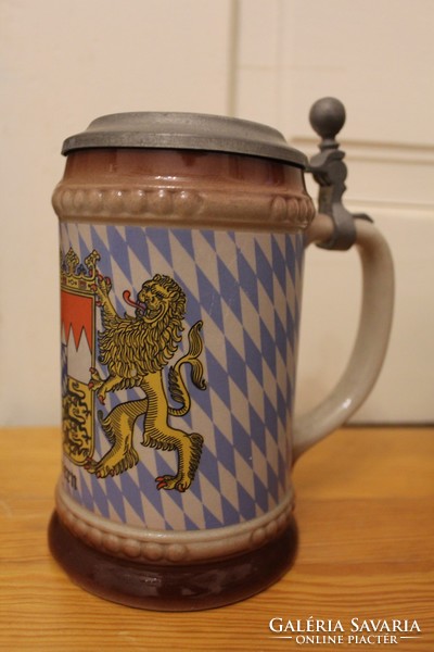 Colorful ceramic jug with a tin top bayern