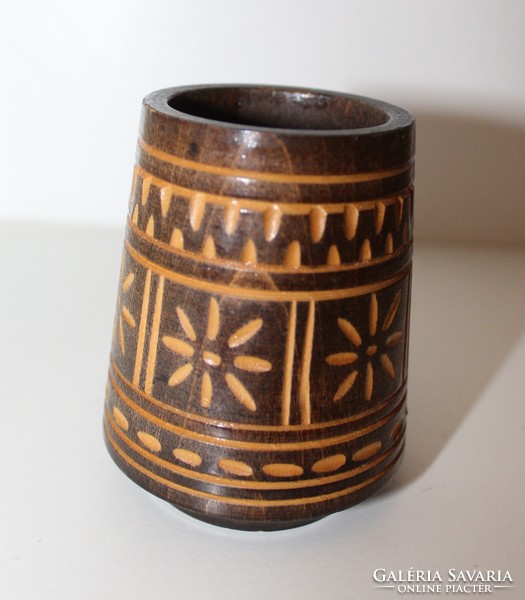 Small ornate wooden cup holder