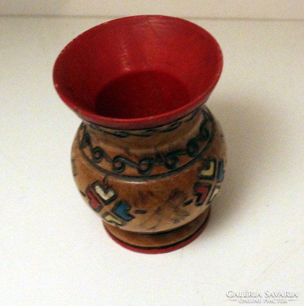 Small wooden ornate colored vase